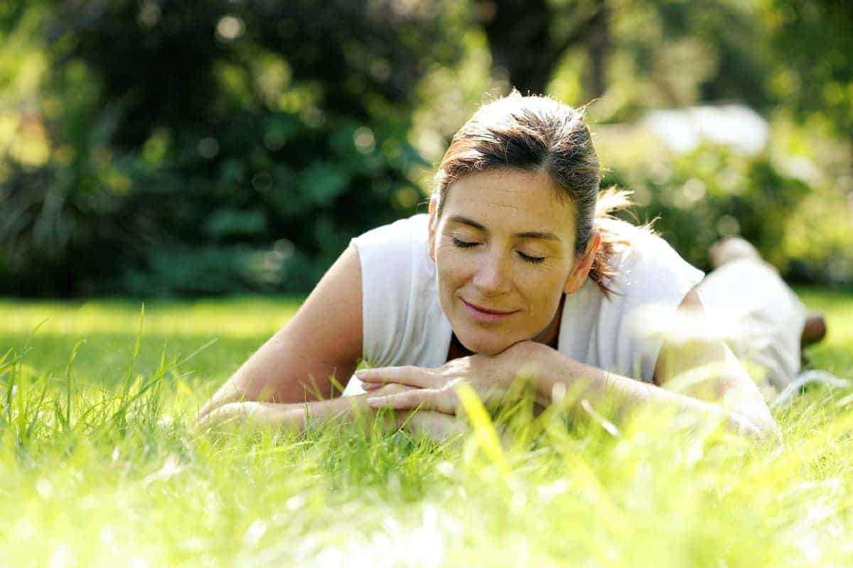 grass woman smiling