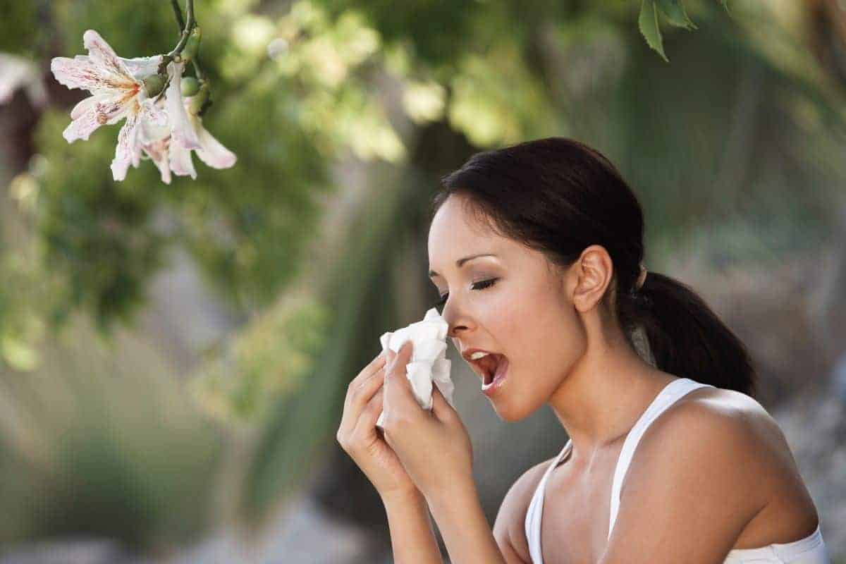 woman sneezing