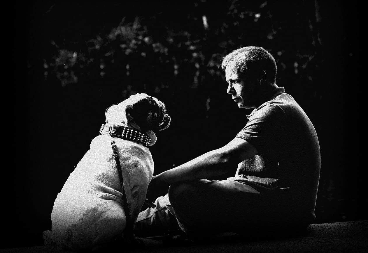 man and dog monochrome