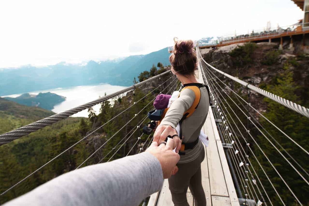 brave woman walking bridge