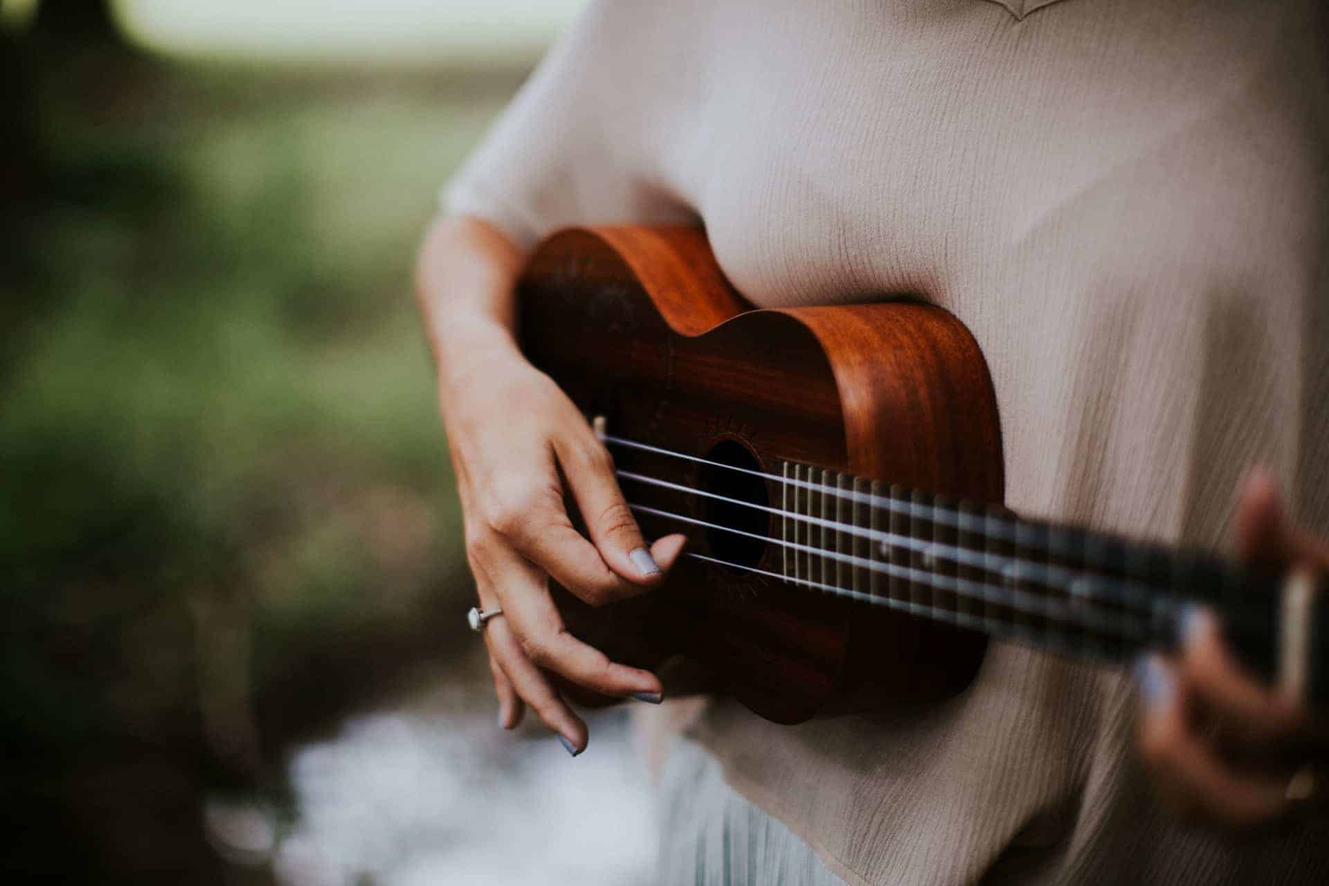 talented woman ukulele