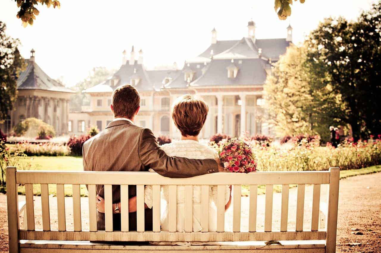 couple sitting bench