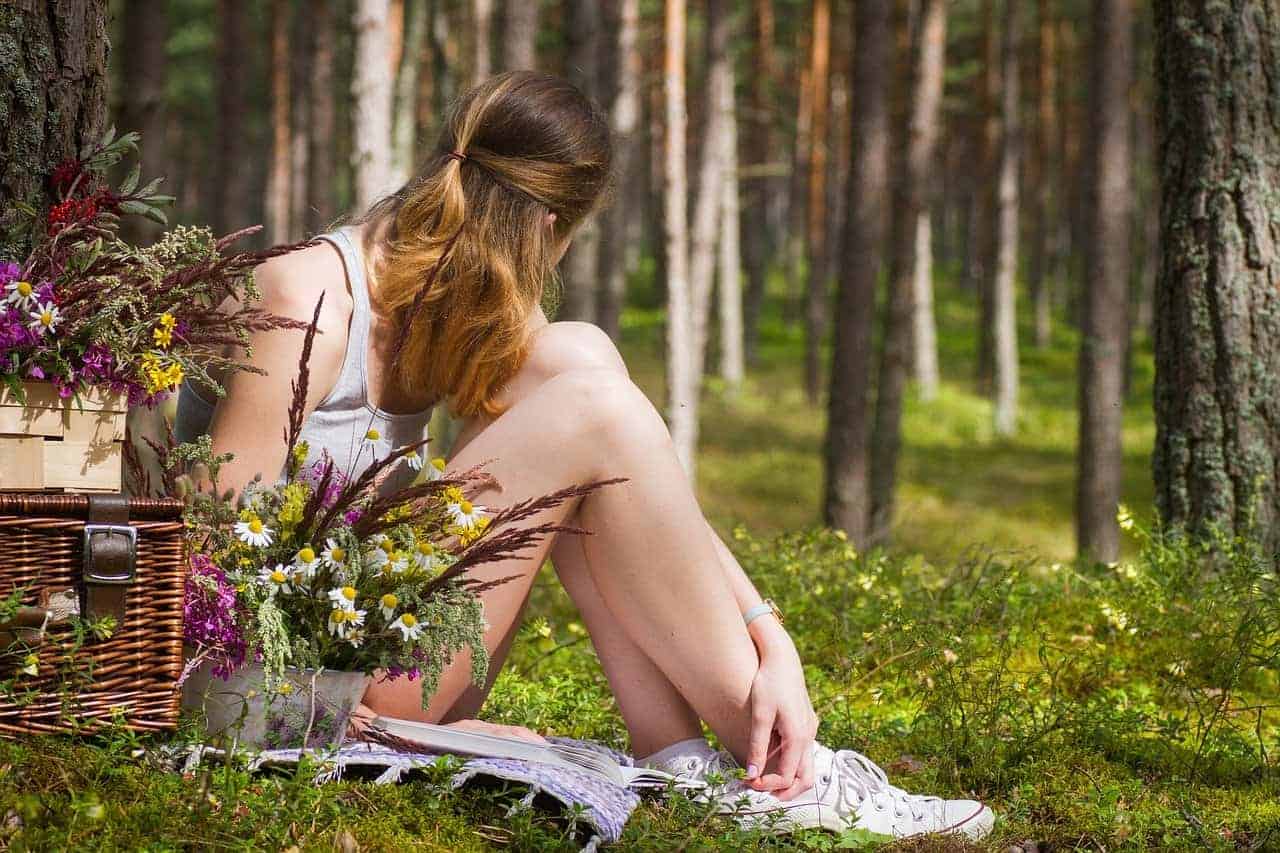 woman grounding trees