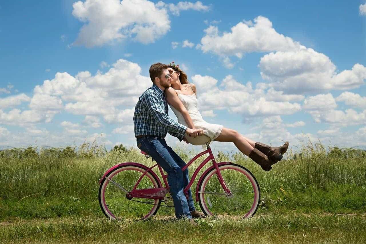 young couple bike