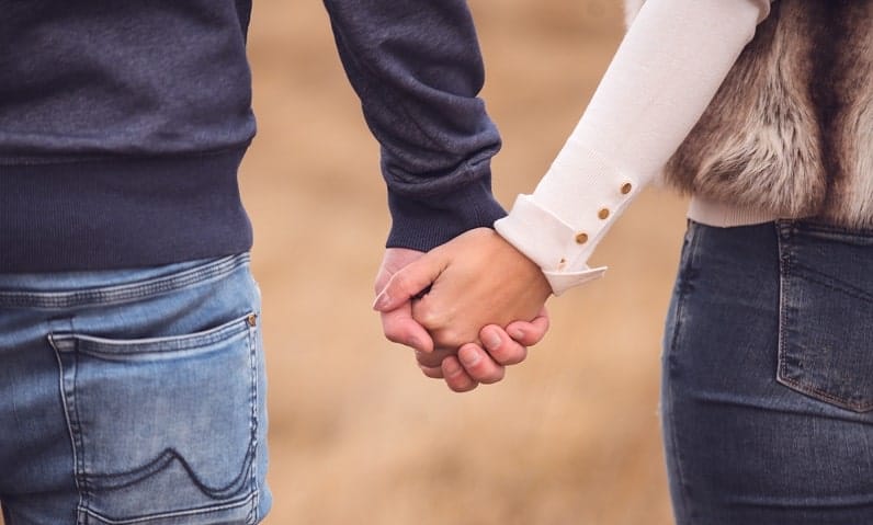 couple holding hands