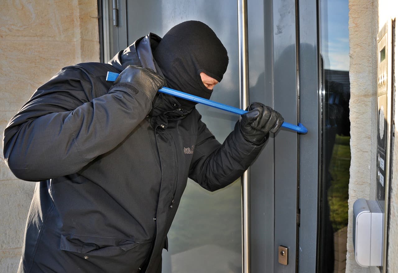 burglar breaking door