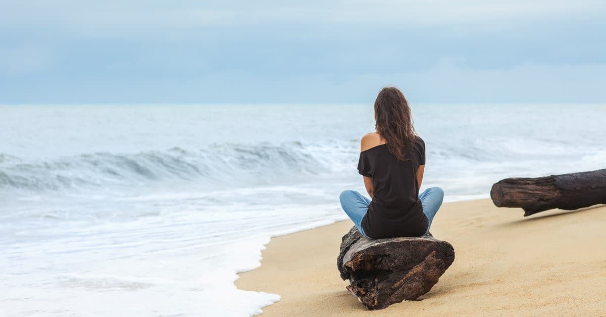 woman alone beach