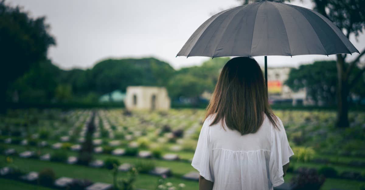 umbrella person graveyard