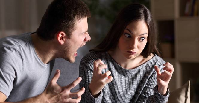 man screaming at a woman