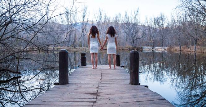 twins holding hands