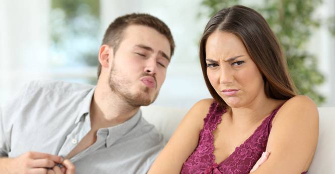 woman repulsed by a man