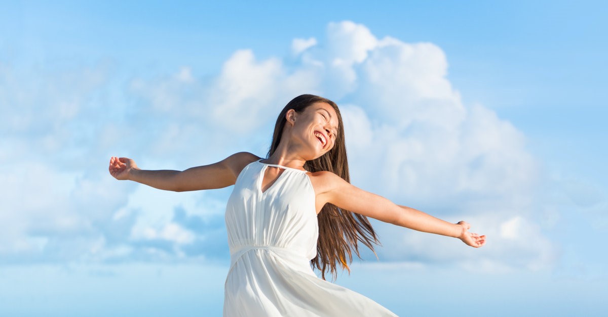 asian woman enjoying the breeze