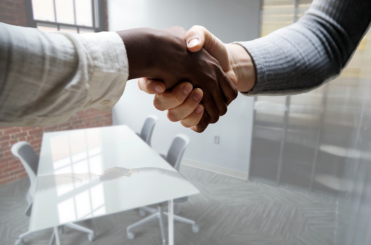 colleagues shaking hands