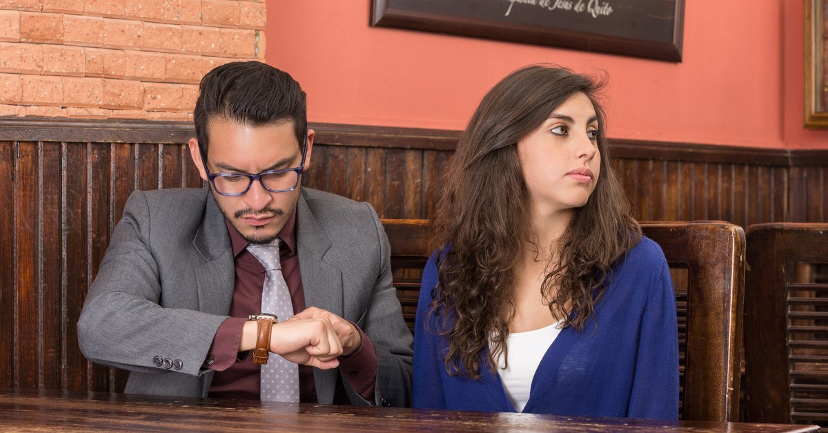 impatient man and woman waiting for waiter