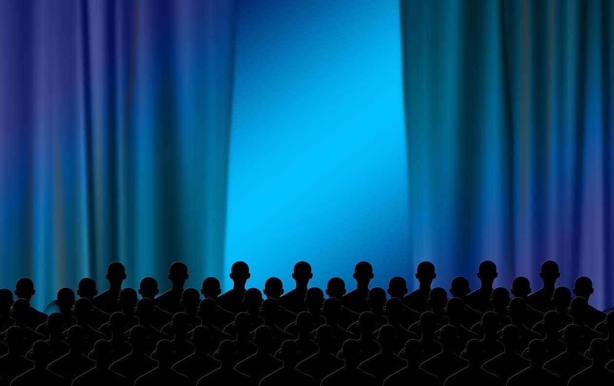 silhoutte of people watching a movie