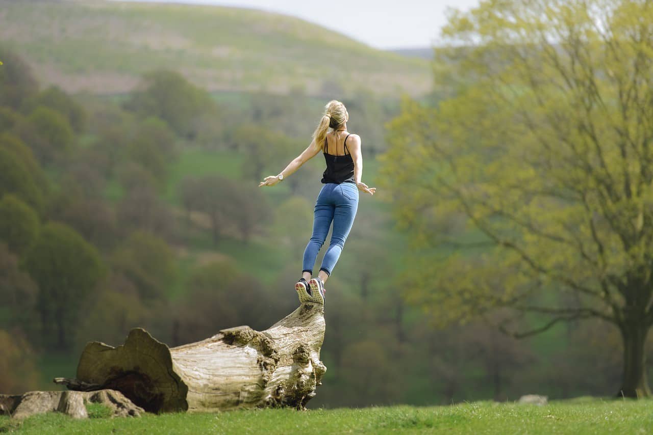 woman opening herself up to nature