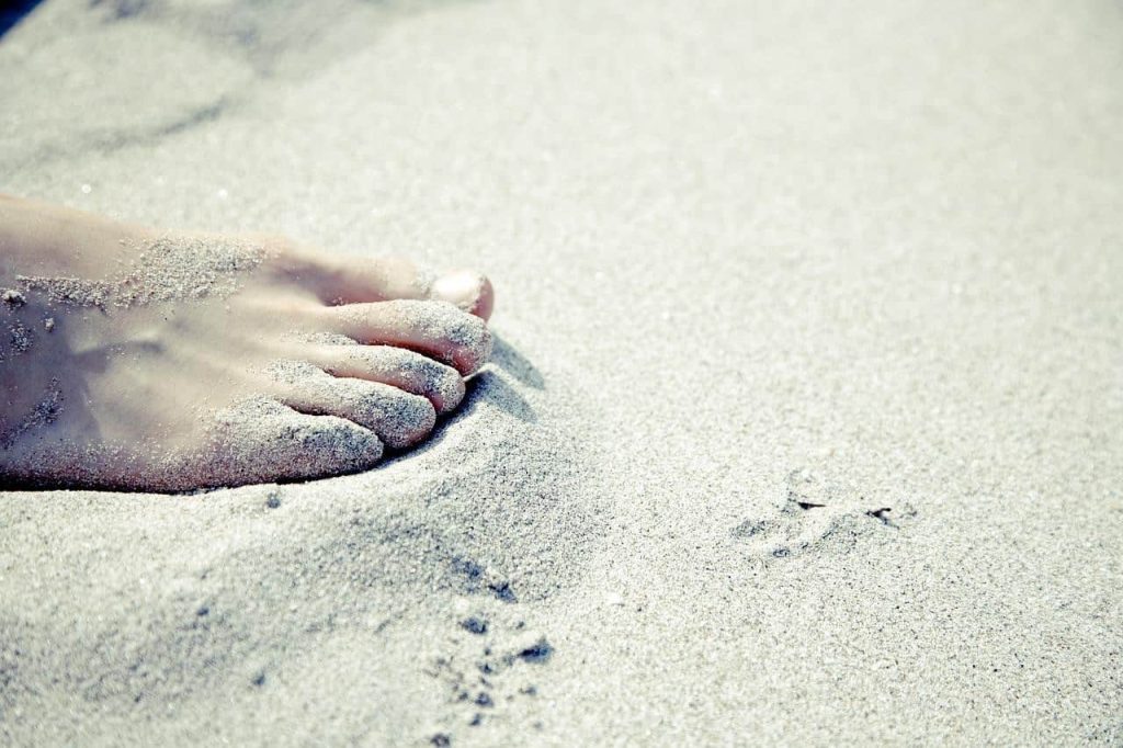 barefoot on sand