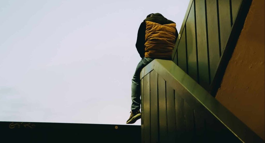 man sitting on a staircase