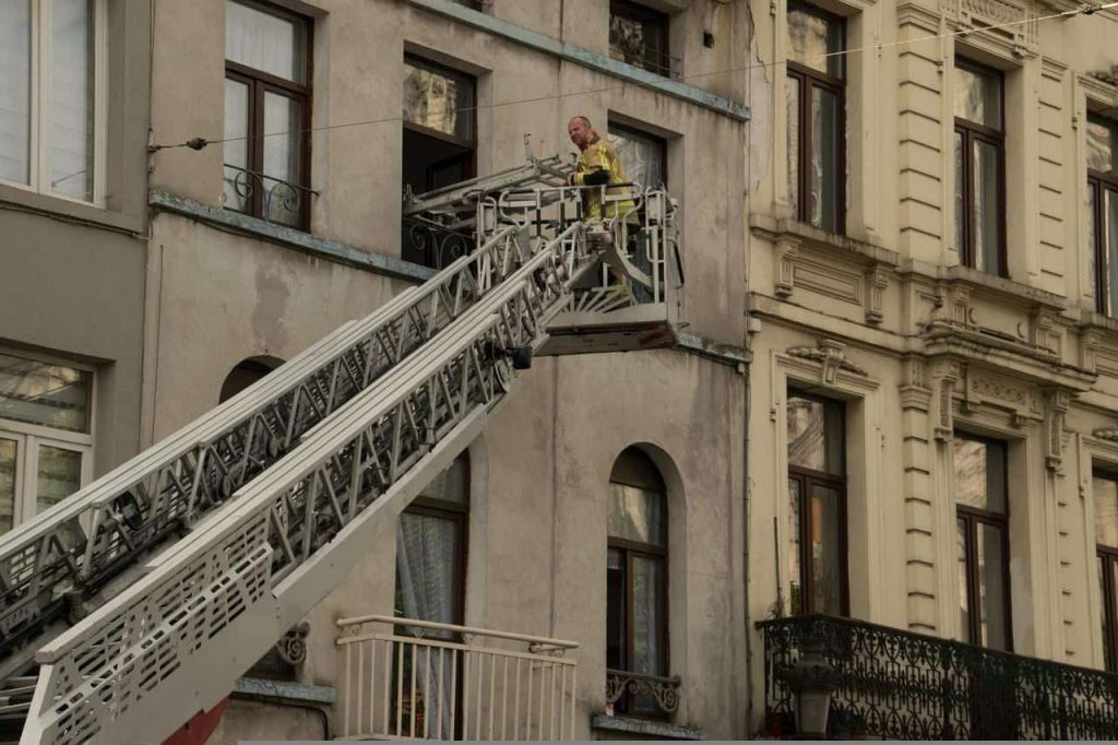 man going inside a building