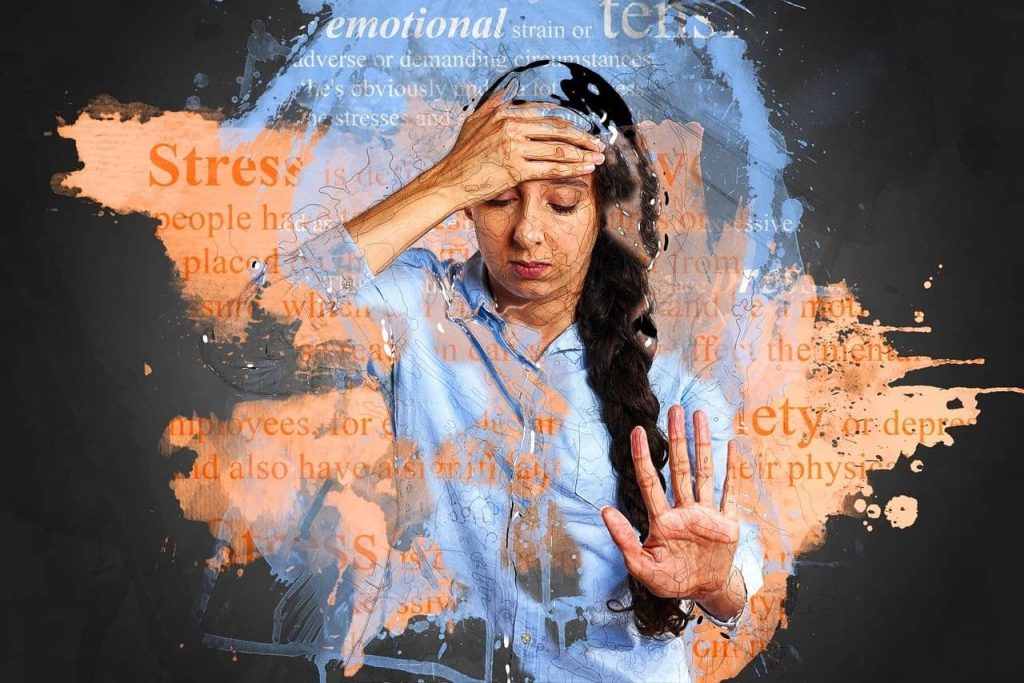 overwhelmed woman with hand on head