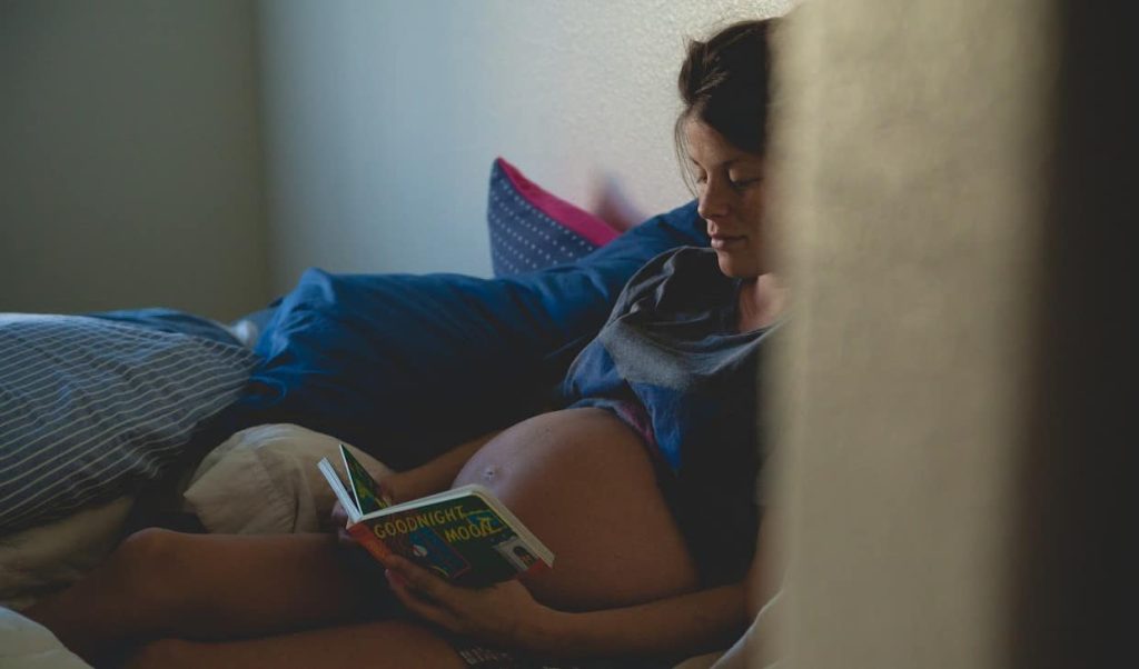 pregnant woman reading