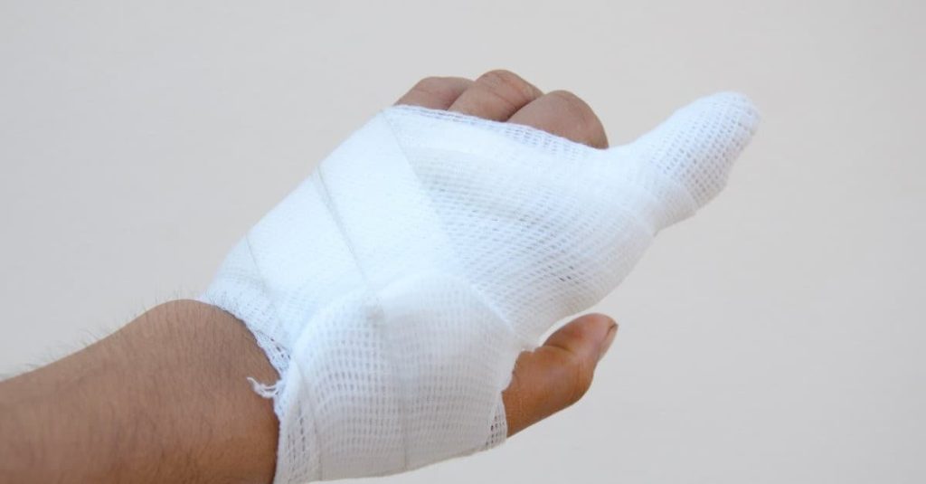 hand covered with bandage