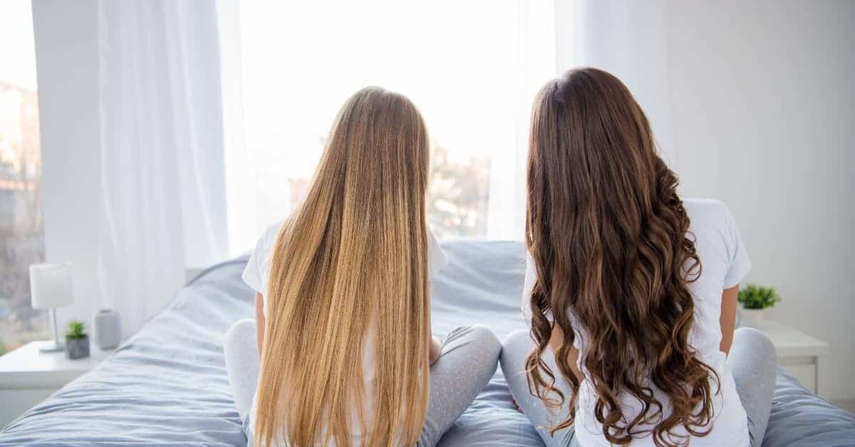 two girls with long hair