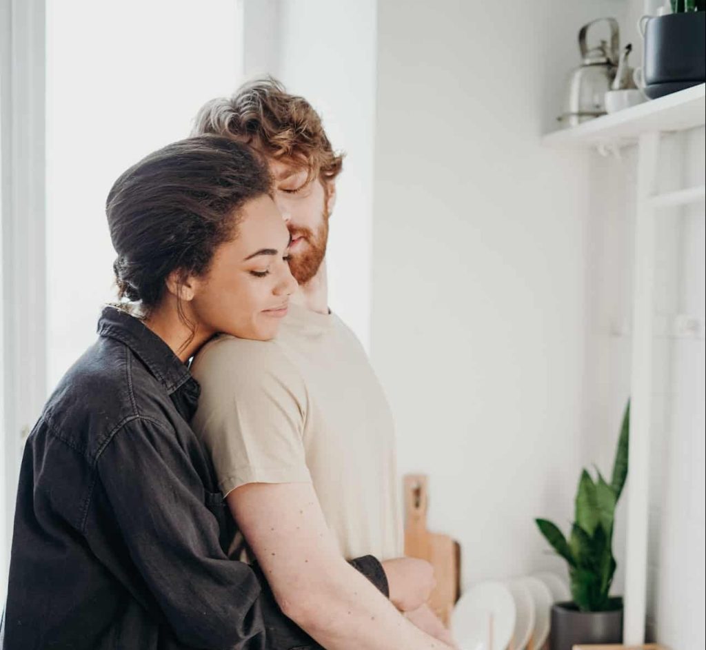 woman hugging boyfriend