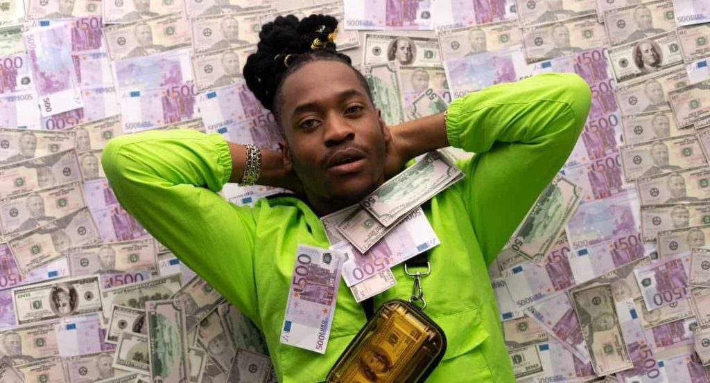 man lying on money