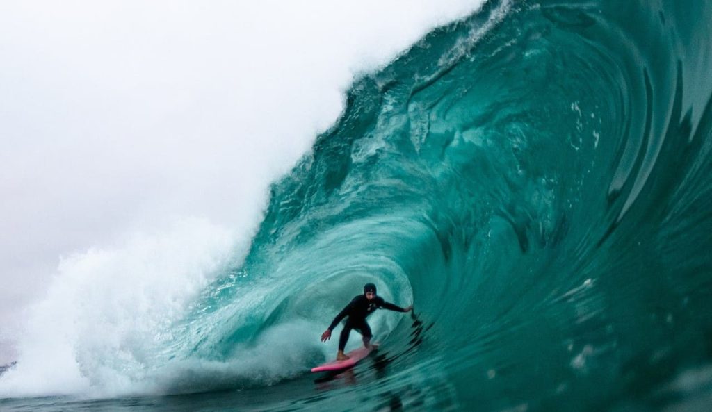 man surfing in a big wave