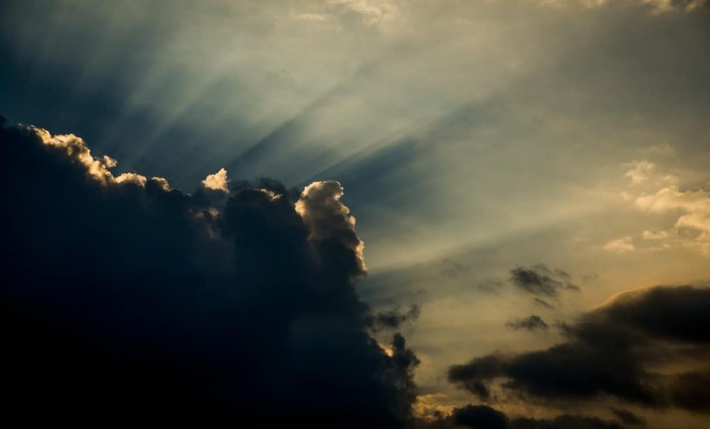 sunrays underneath a cloud