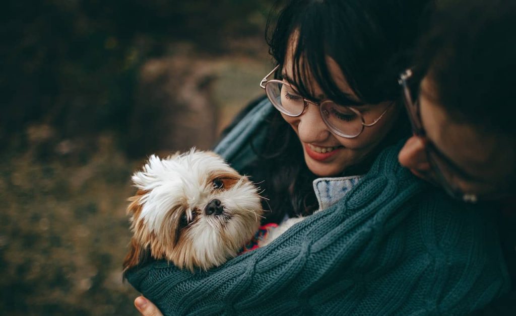 couple with their dog