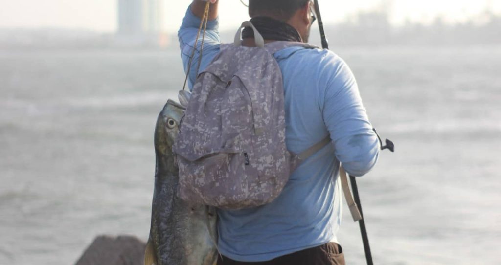 man holding a big fish