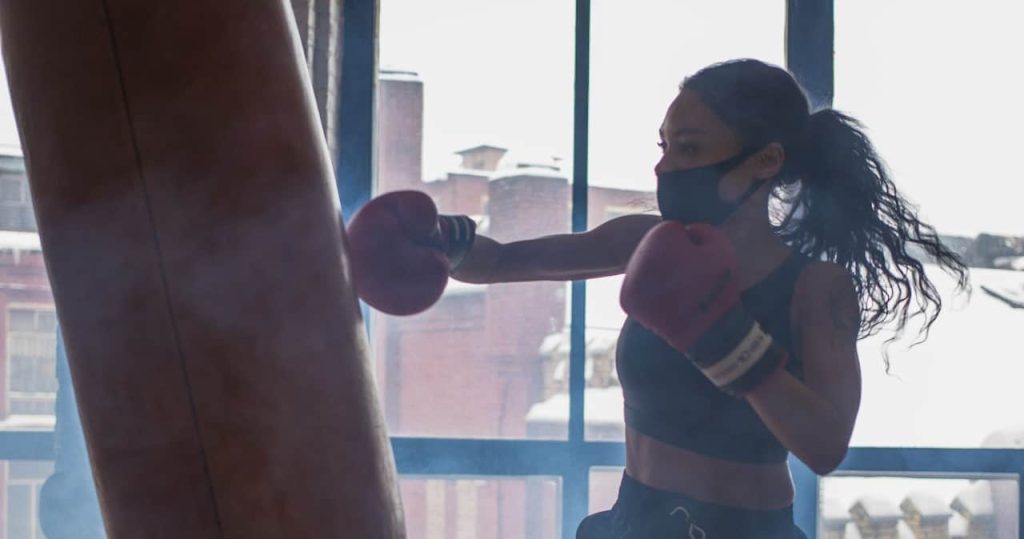 woman punching bag