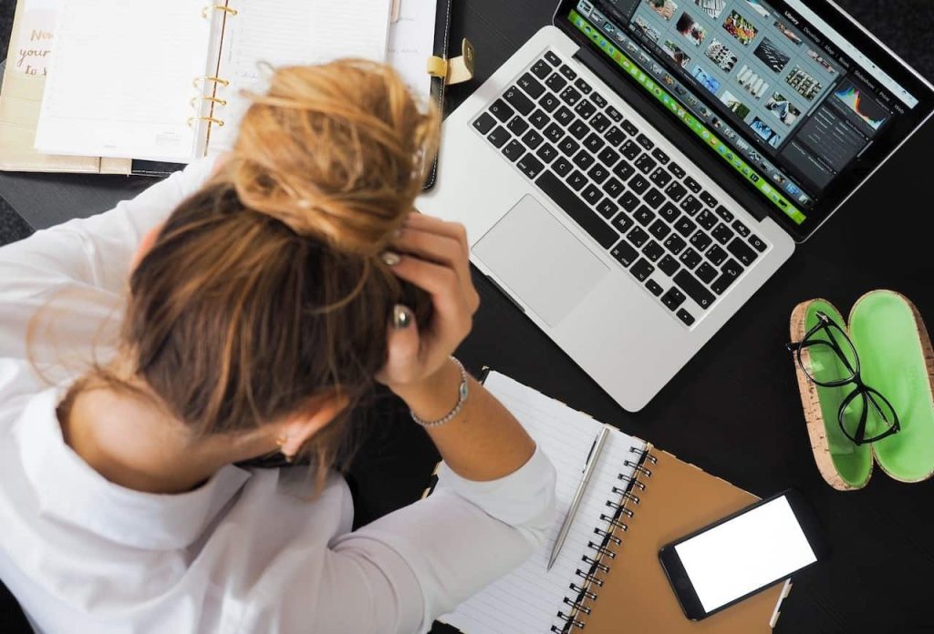 woman working in front of her laptop