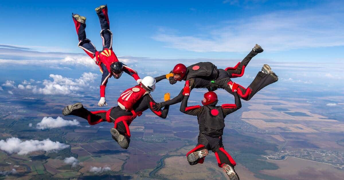 4 people skydiving